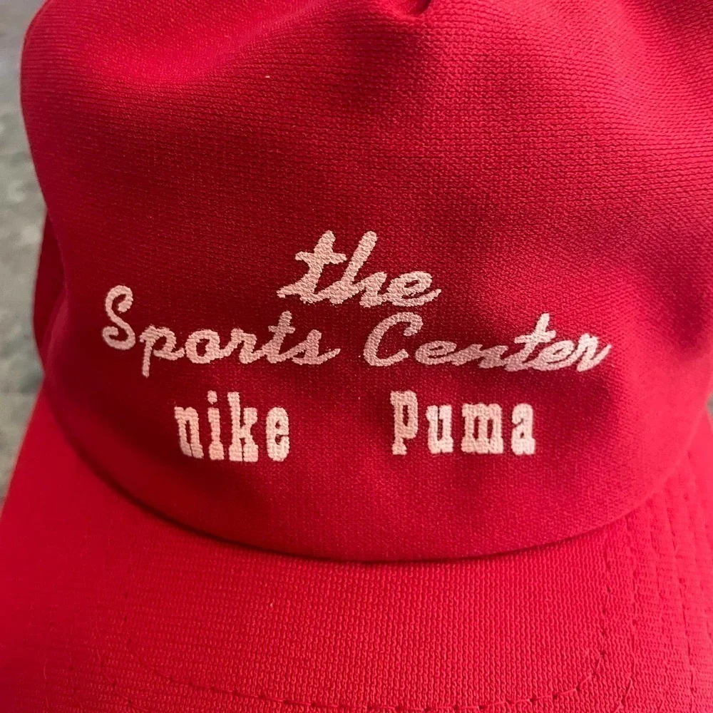 Vintage The Sports Center Nike Puma Script New Era USA Red Snapback Hat 80s 90s